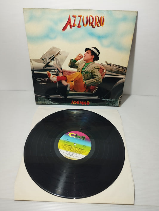 Azzurro/Una Carezza In Un Pugno Adriano Celentano LP 33 giri
Edito negli anni 60 da Clan Cod .ACC.LP.40011