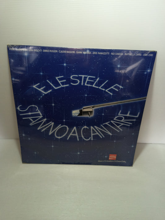 E Le Stelle Stanno A Cantare LP 33 Giri
Edito nel 1986 per Coca Cola da CGD Cod.COM 20561