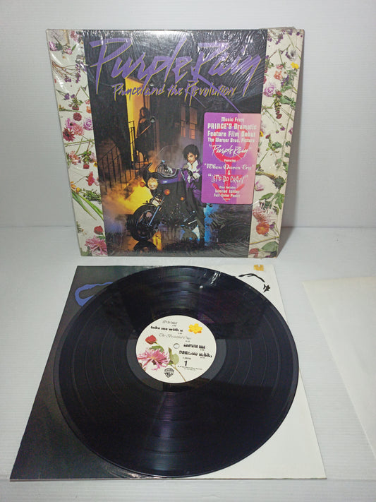 Purple Rain Prince And The Revolution LP 33 giri
Edito nel 1984
Incluso :limited Editon Full- Color Poster