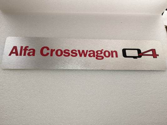 Alfa Crosswagon Q4 Alfa Romeo advertising sign in flexible plastic

 Sign dimensions 52 x 11 cm