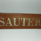 Sauter 1819 Vintage Advertising Sign