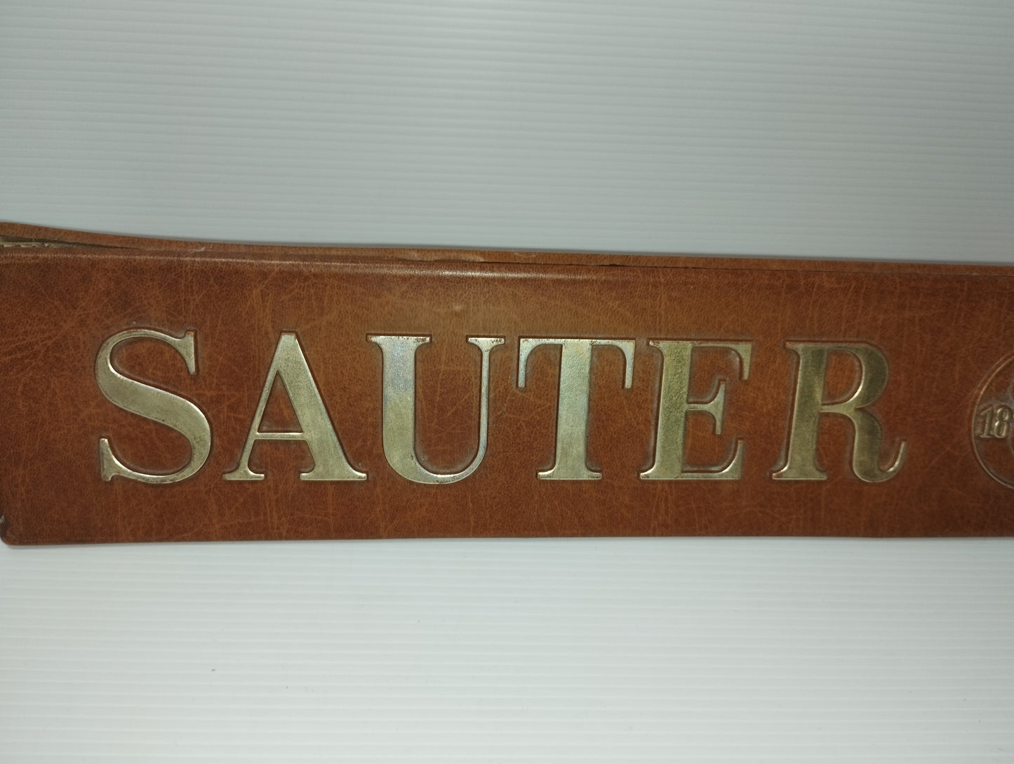 Sauter 1819 Vintage Advertising Sign