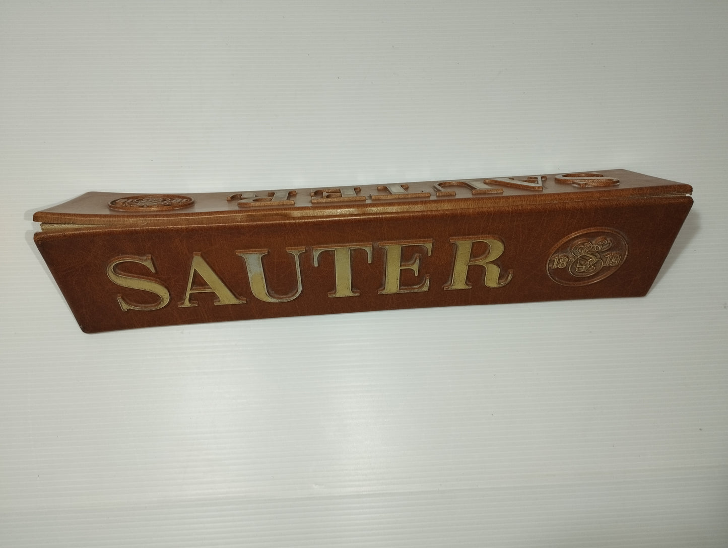 Sauter 1819 Vintage Advertising Sign