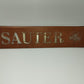 Sauter 1819 Vintage Advertising Sign