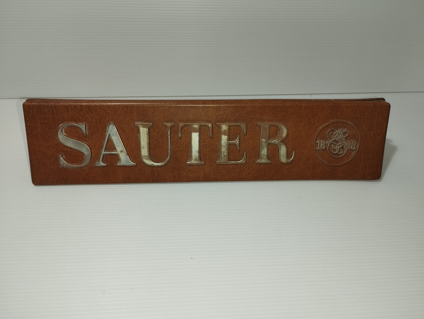 Sauter 1819 Vintage Advertising Sign