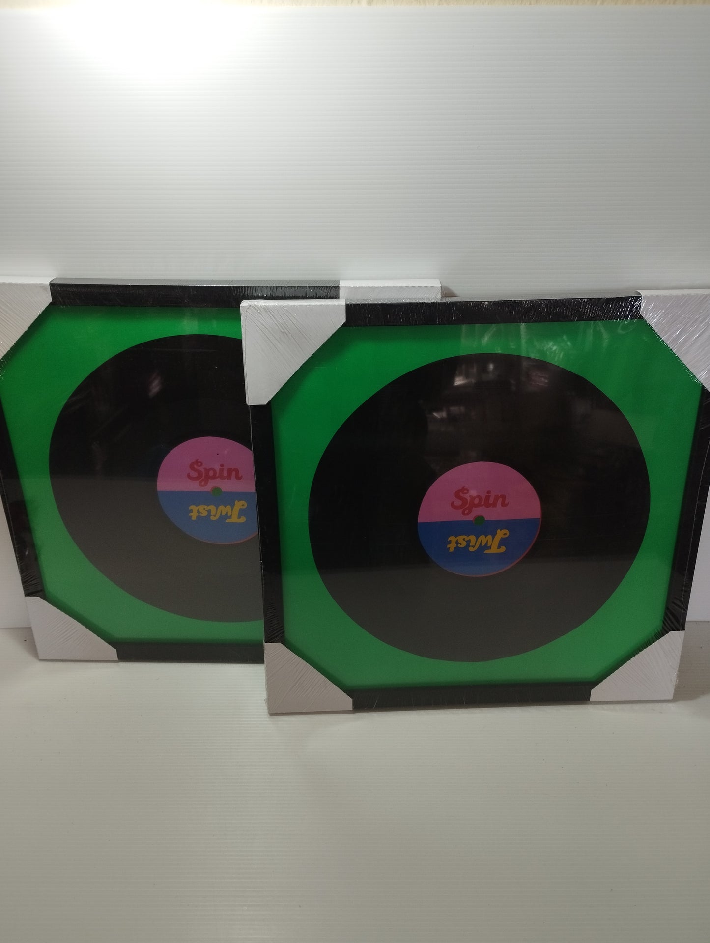 2 frames for LP 33 rpm

 Made of wood and glass