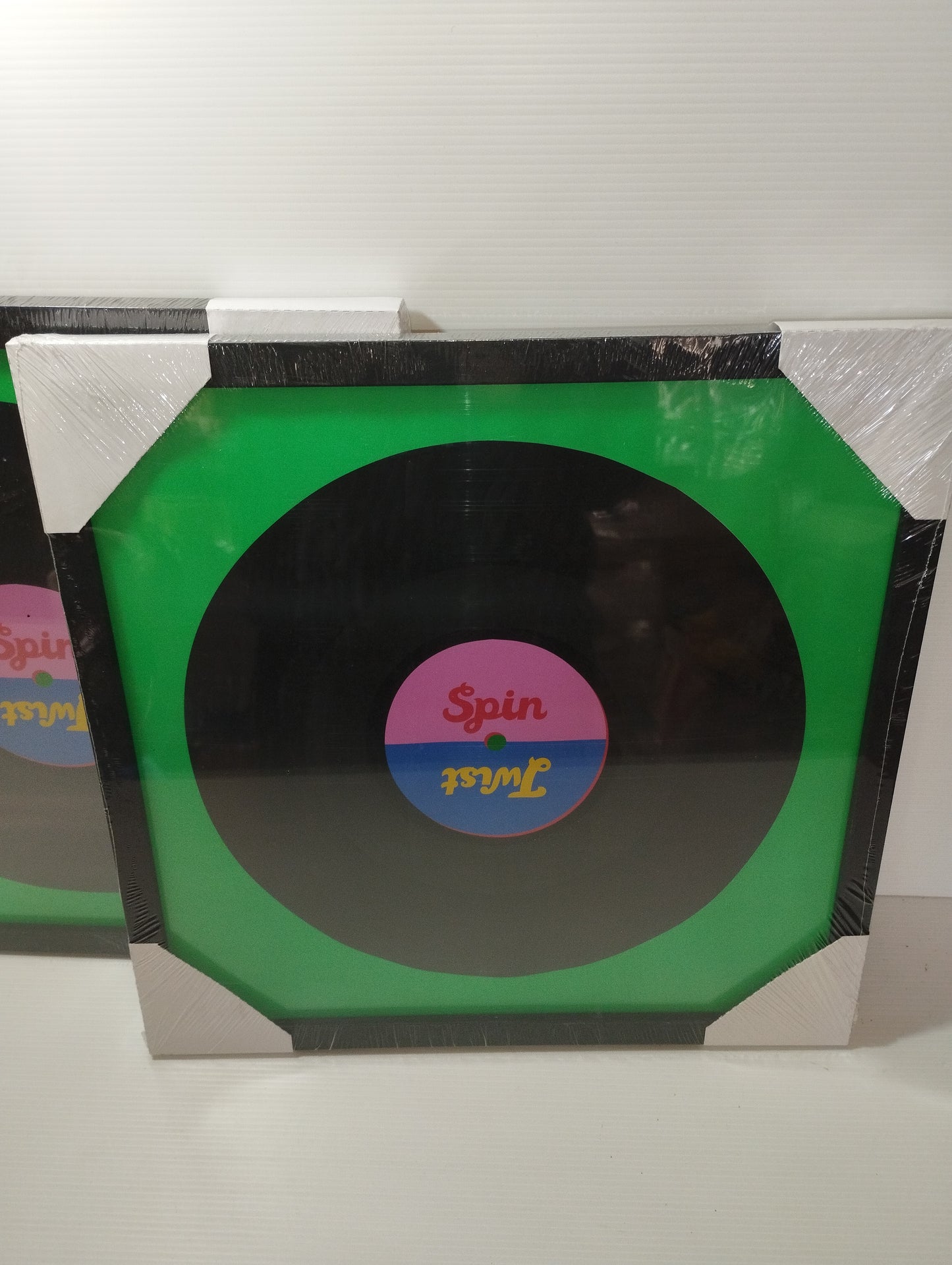 2 frames for LP 33 rpm

 Made of wood and glass