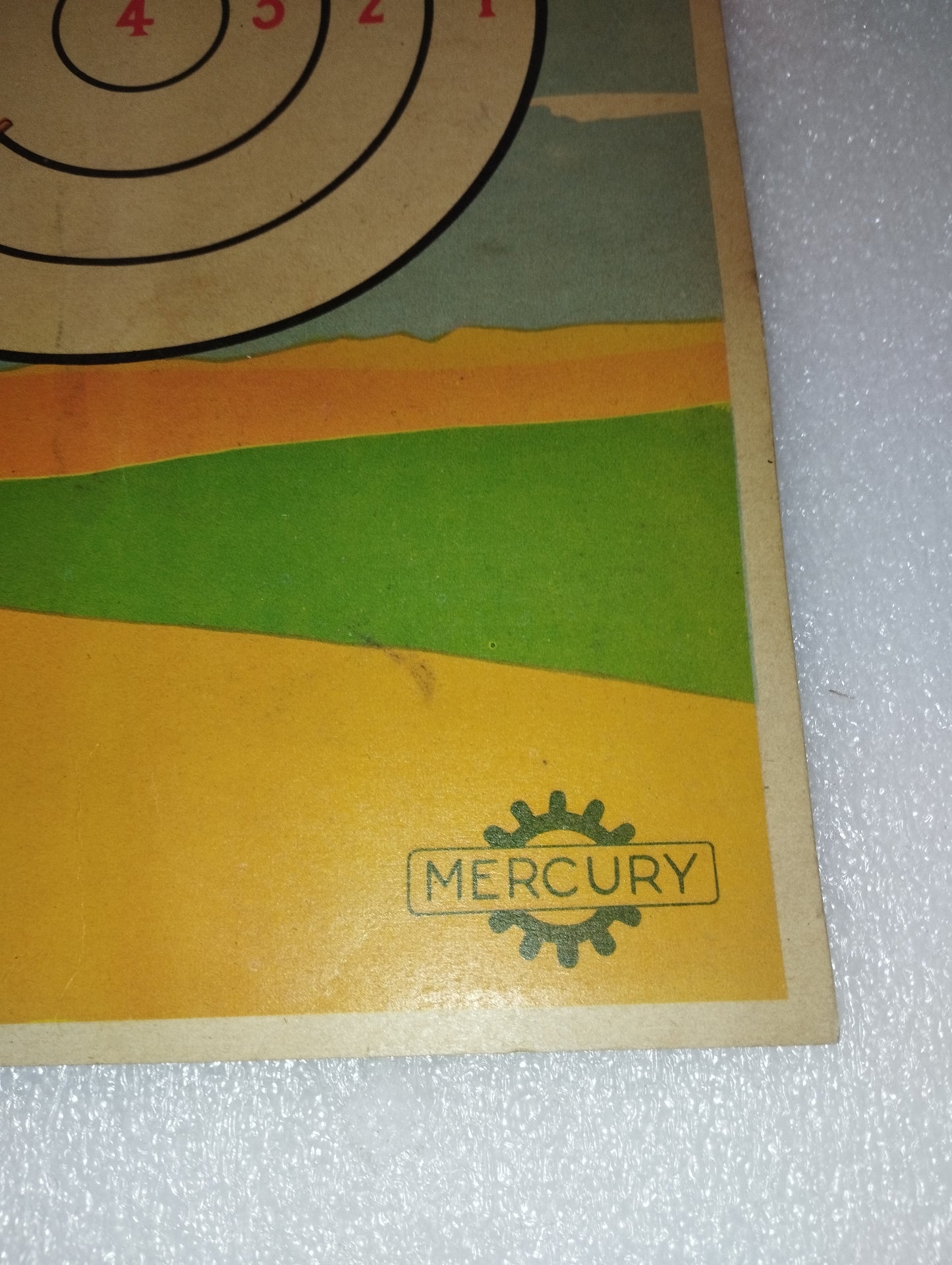 Mercury target in vintage cardboard