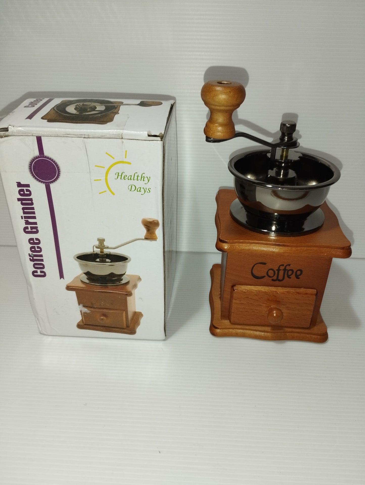 Handmade Coffee Grinder

 In wood and metal