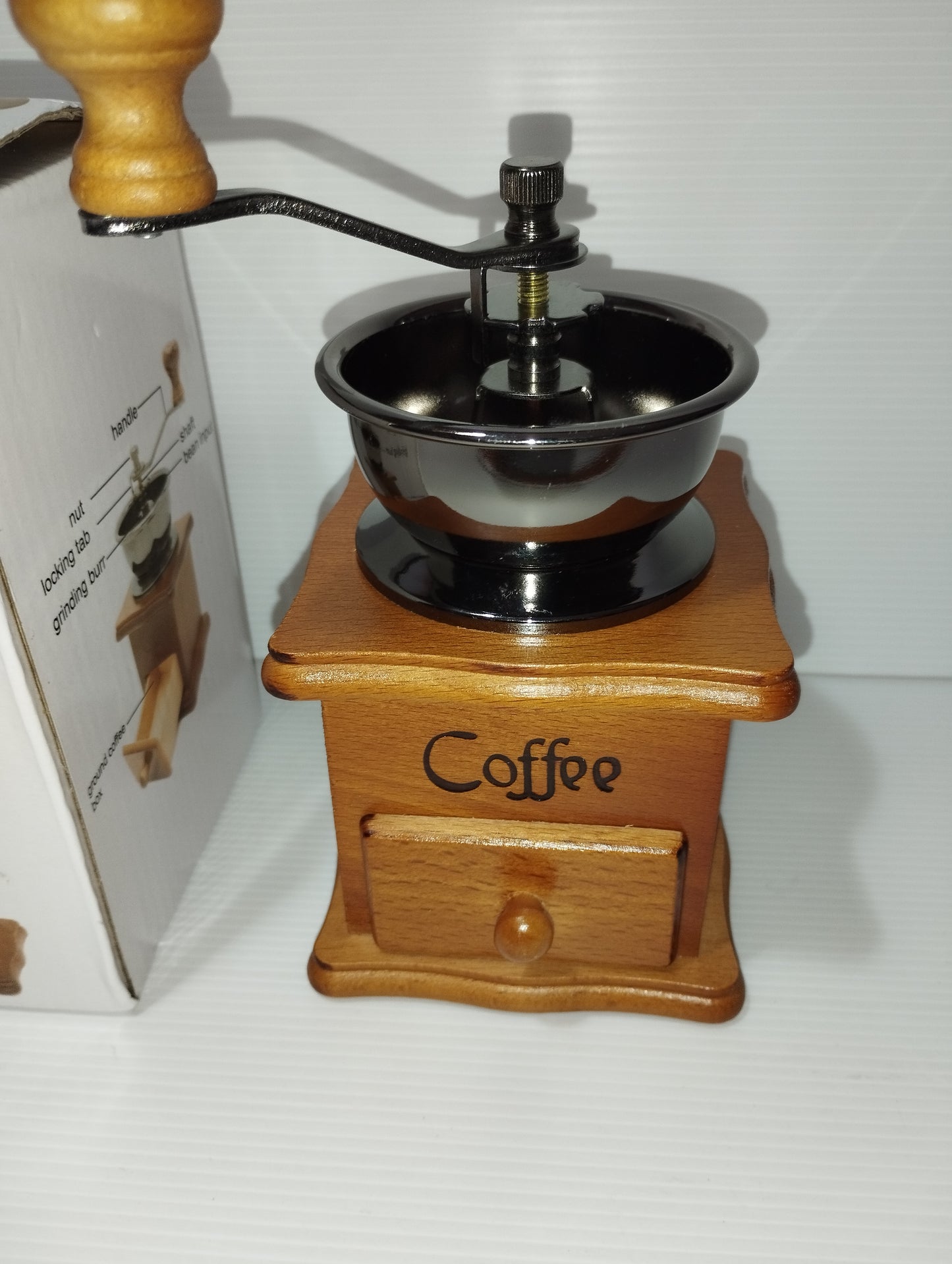 Handmade Coffee Grinder

 In wood and metal