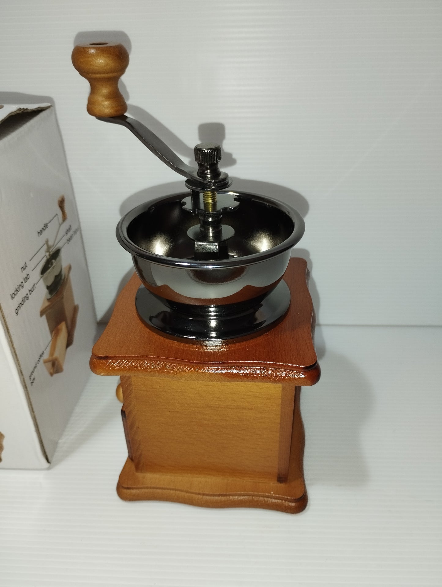 Handmade Coffee Grinder

 In wood and metal