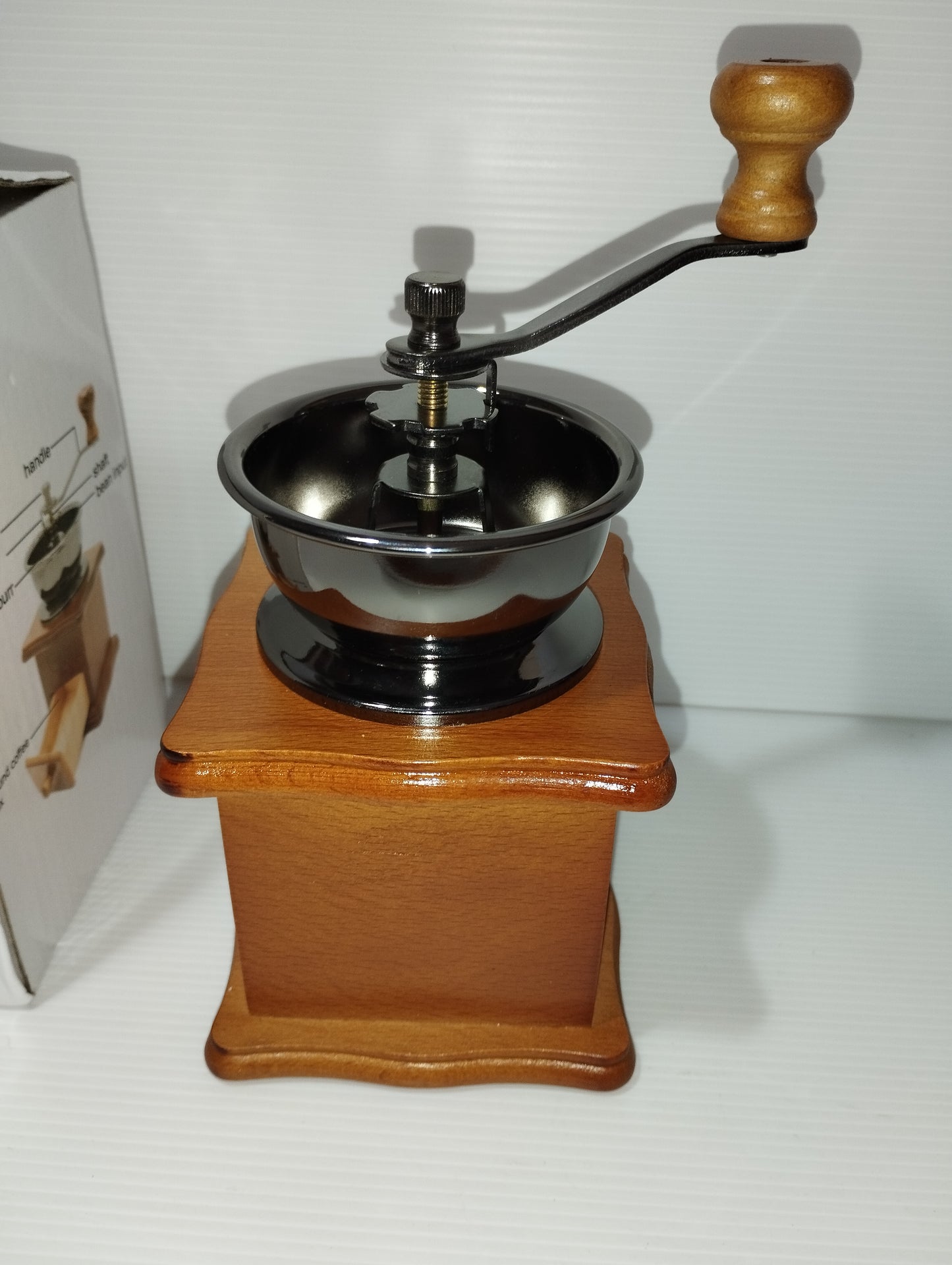 Handmade Coffee Grinder

 In wood and metal