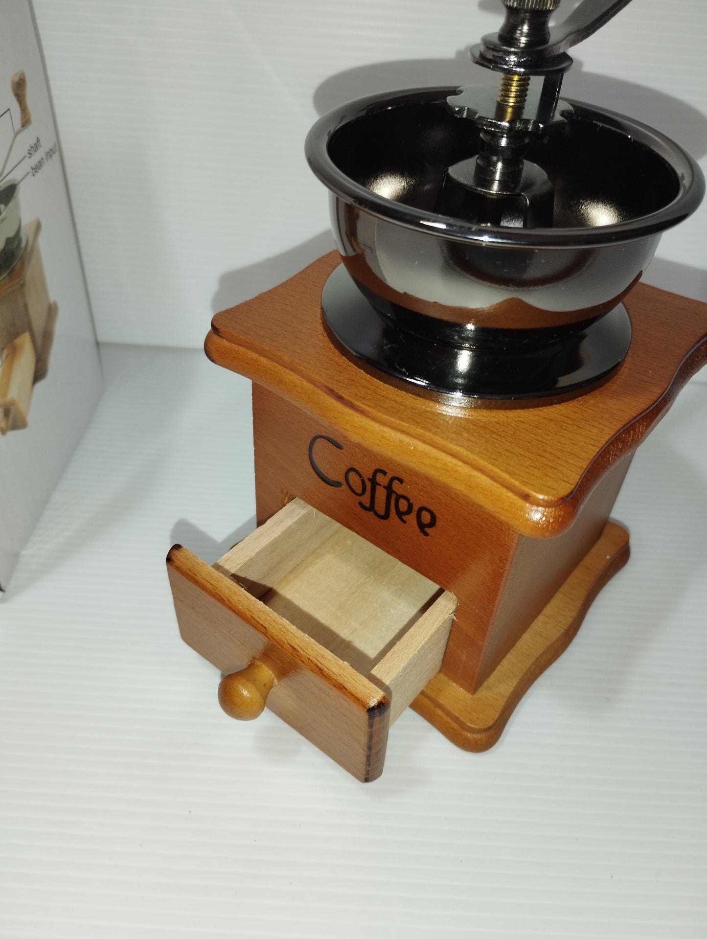 Handmade Coffee Grinder

 In wood and metal