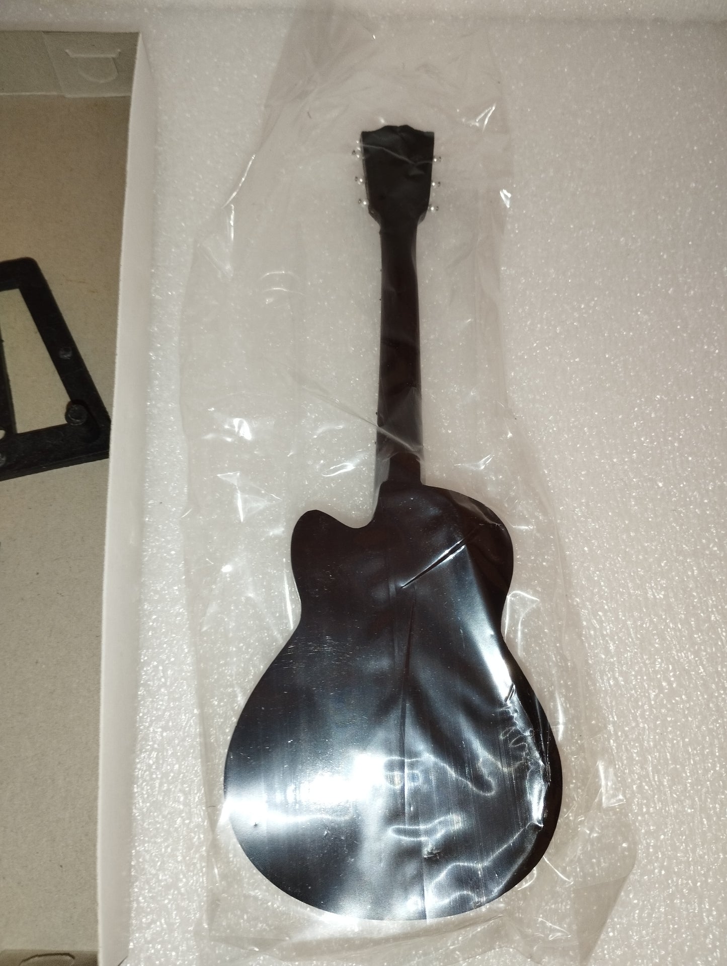 "GB" Acoustic Guitar Model

 Made of wood with plastic parts