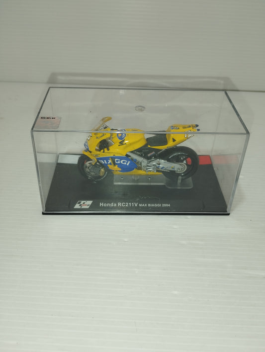 Modellino moto Honda RC211V Max Biaggi 2004
Scala 1:24