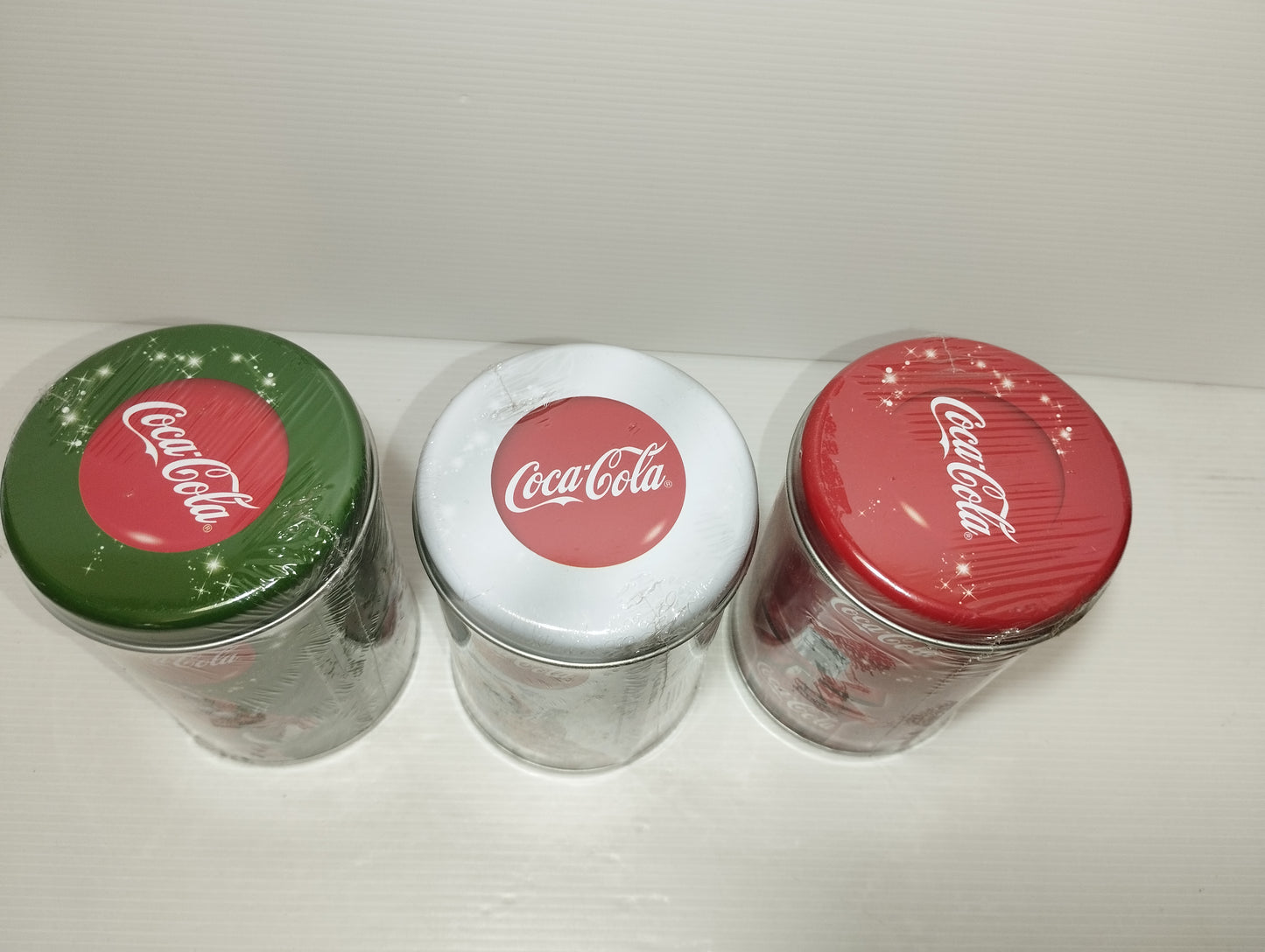 Coca Cola 3 Barattoli Natalizi In Latta

Altezza barattolo cm 12