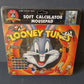 Looney Tunes mouse pad and calculator, original from the 90s