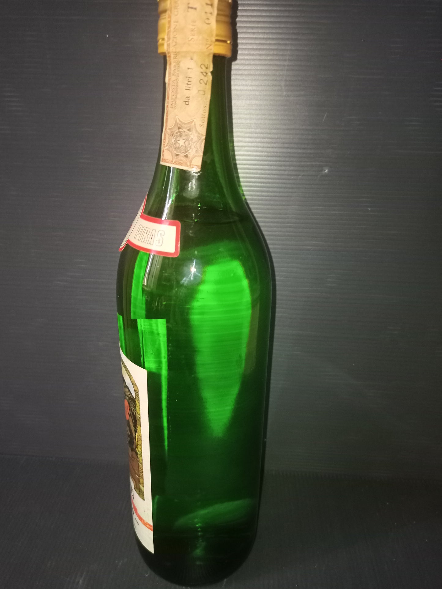 Zedda Piras pomace brandy bottle, 1970s