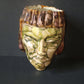 Ancient glazed ceramic head