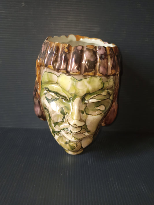 Ancient glazed ceramic head