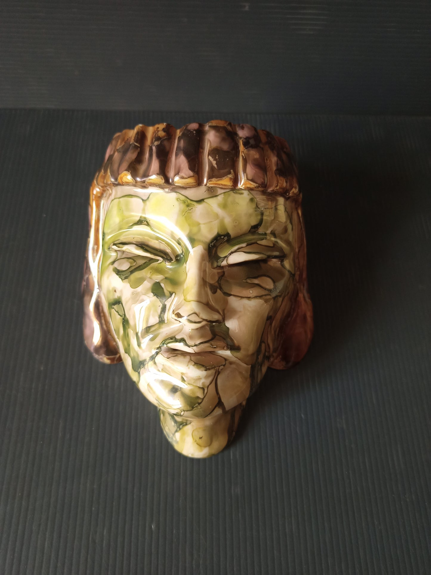 Ancient glazed ceramic head