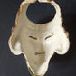 Ancient glazed ceramic head