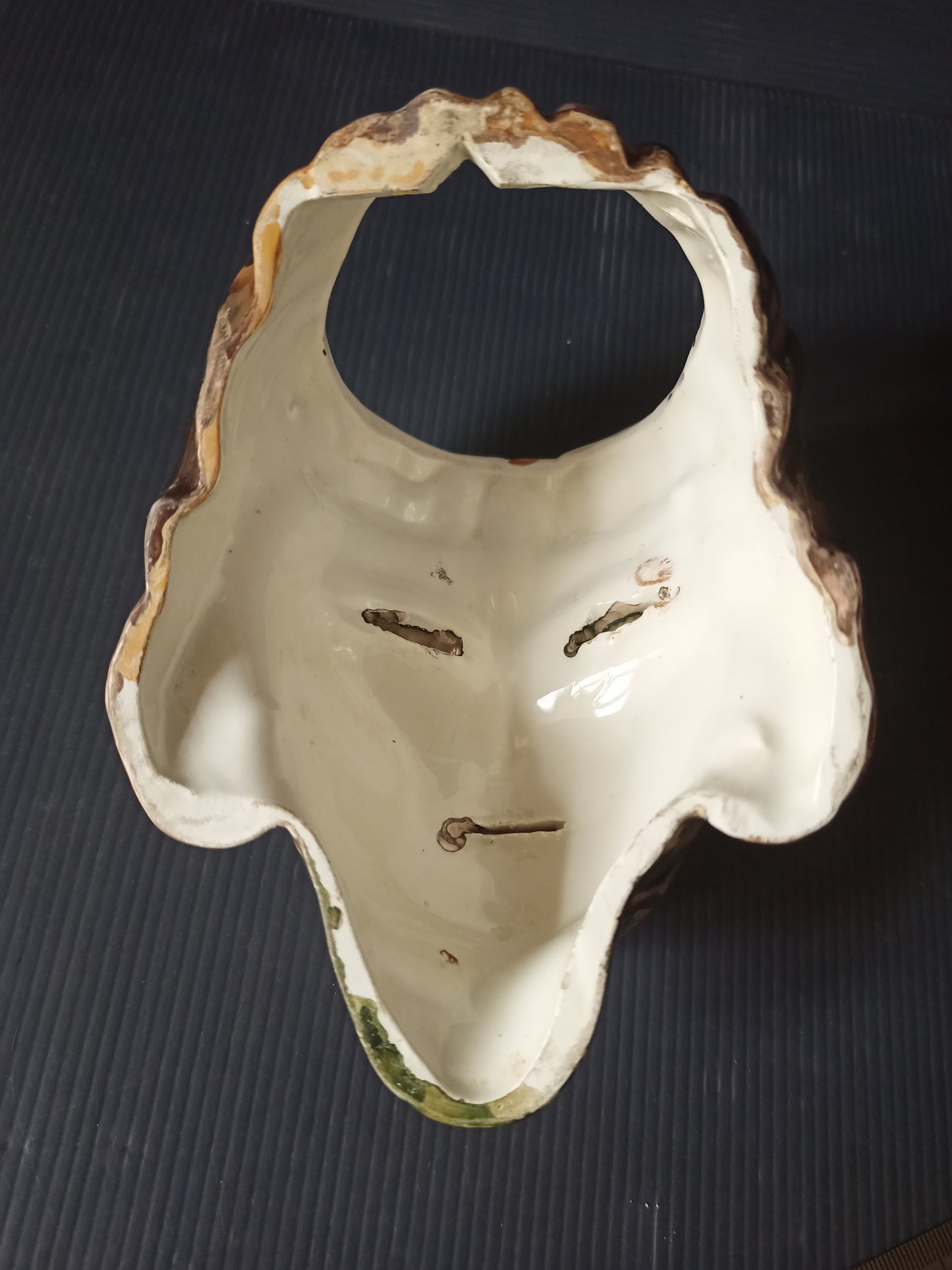 Ancient glazed ceramic head