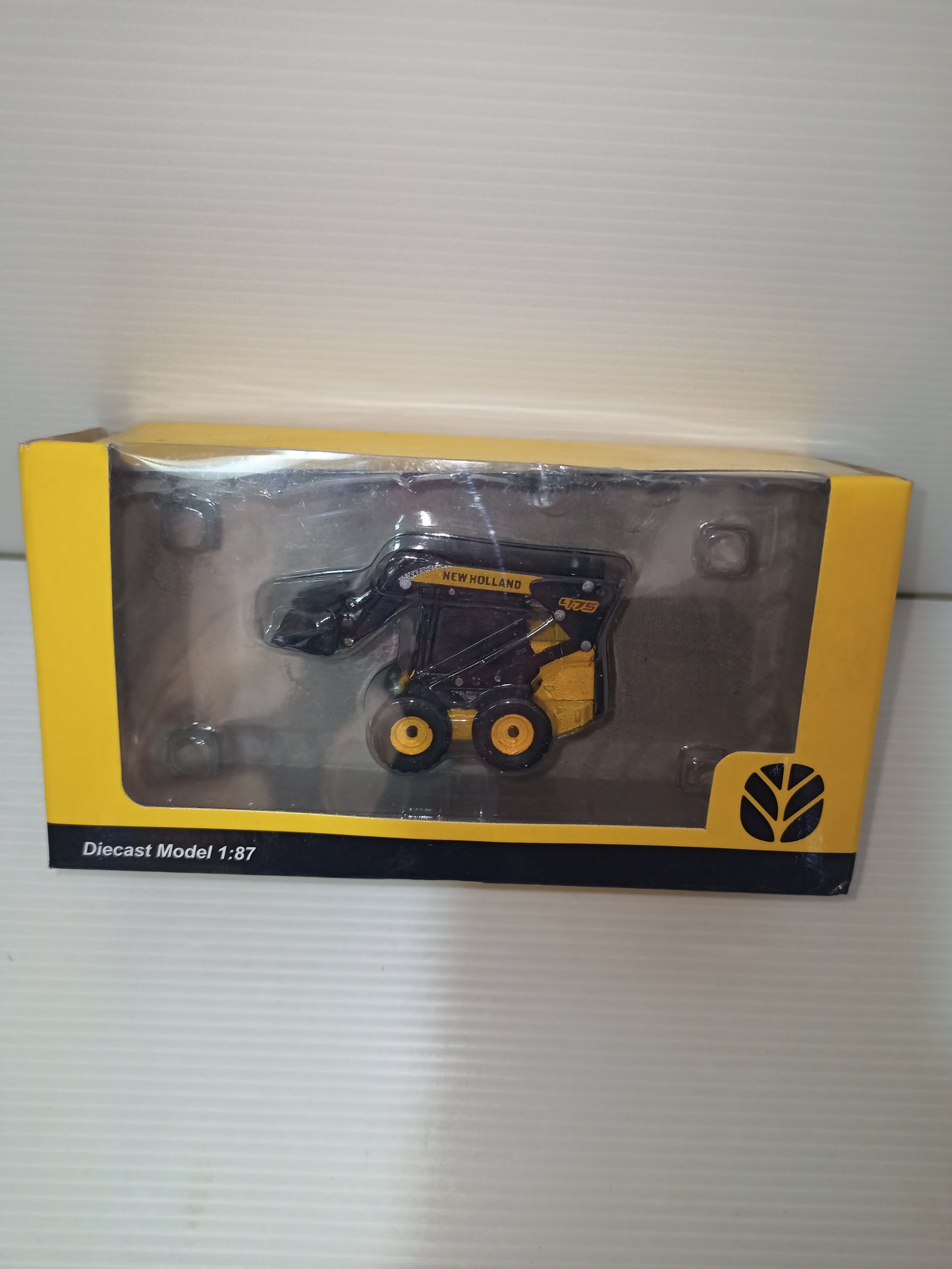 Modellino mini pala gommata L175 New Holland, scala 1:87