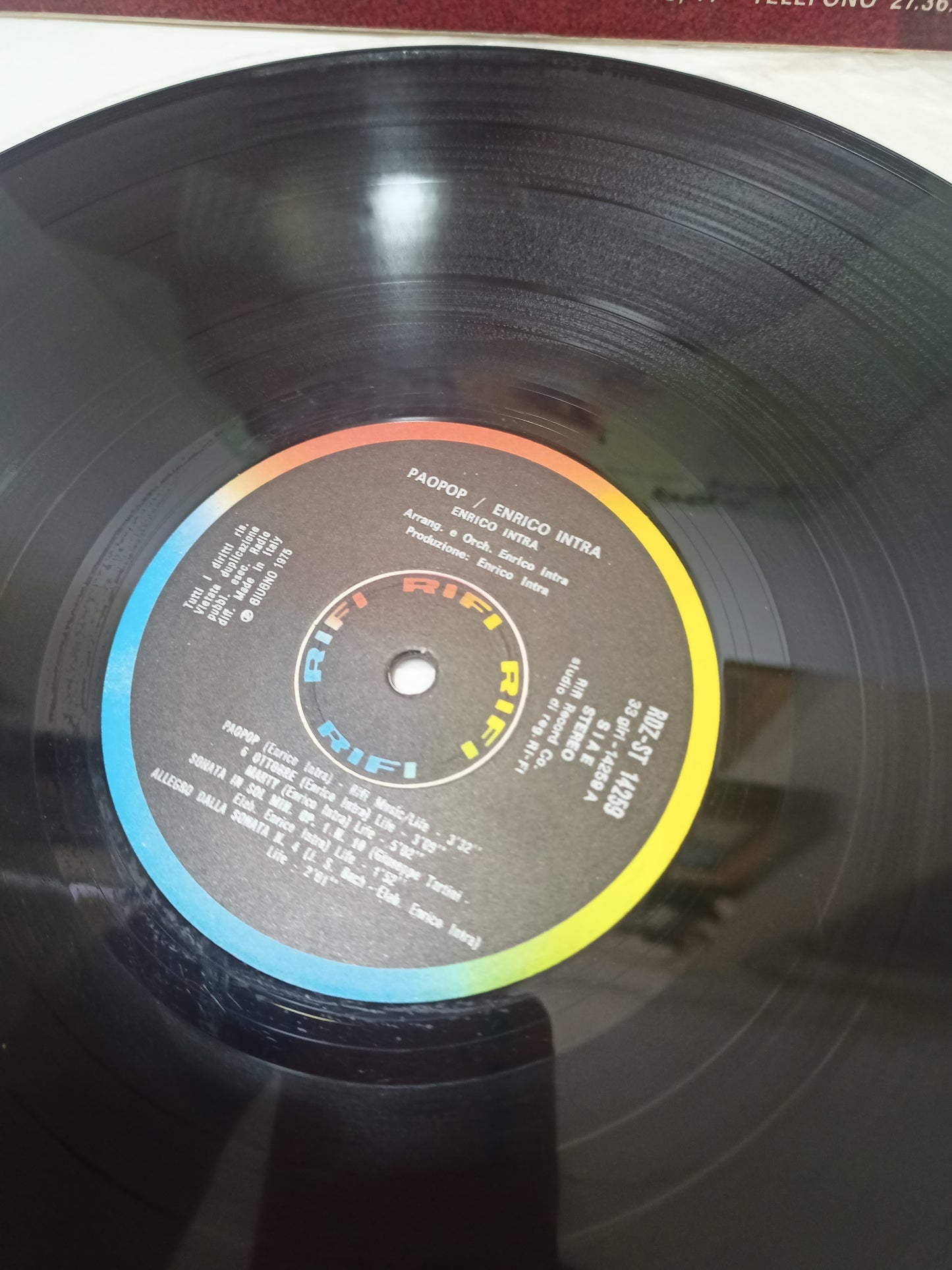 Paopop Enrico Intra LP 33 Giri
Edito nel 1975 da RiFi Cod.RDZ-ST 14259
Genere: electronic,jazz,Pop