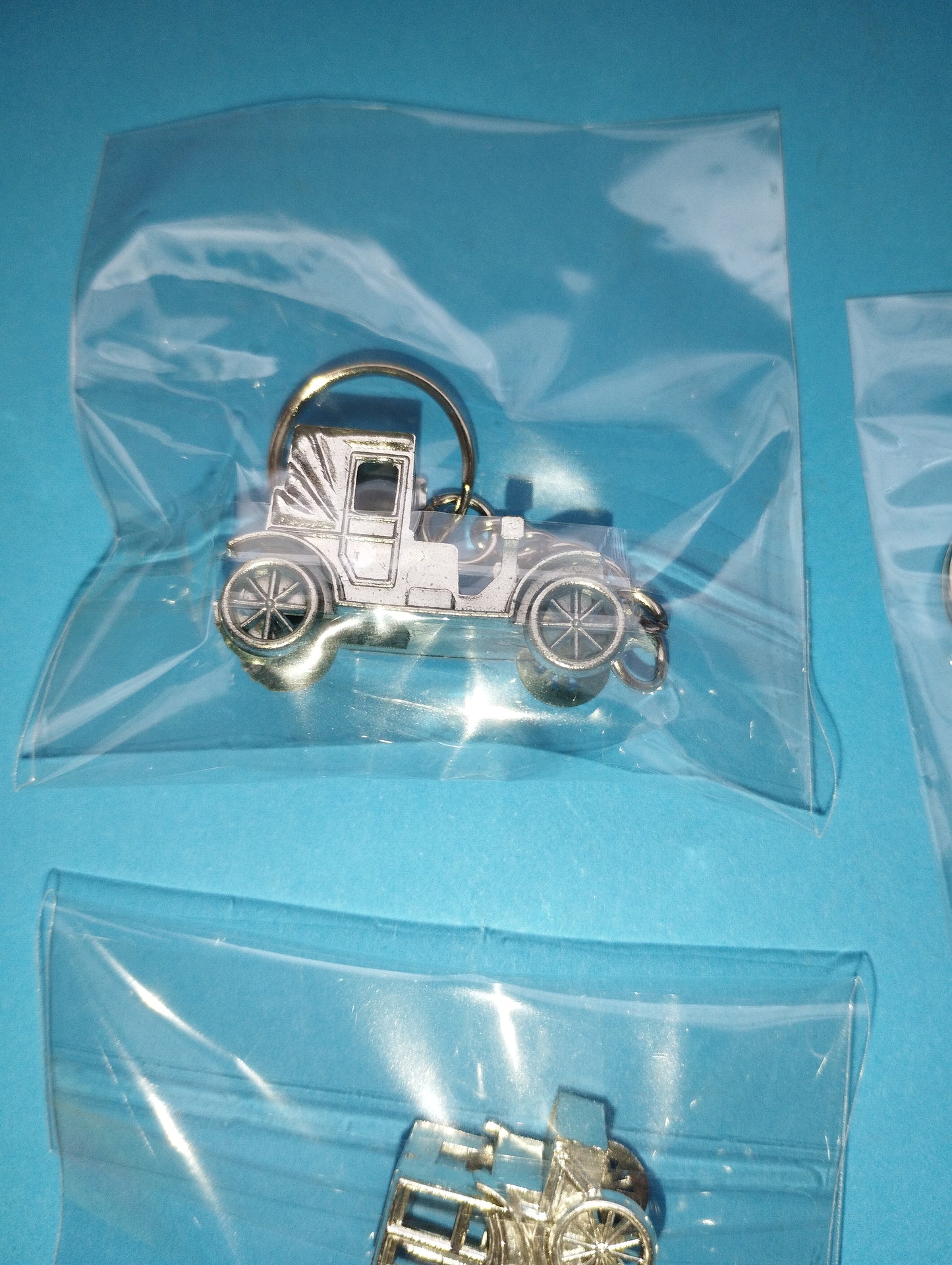 Lot of 4 vintage car key rings