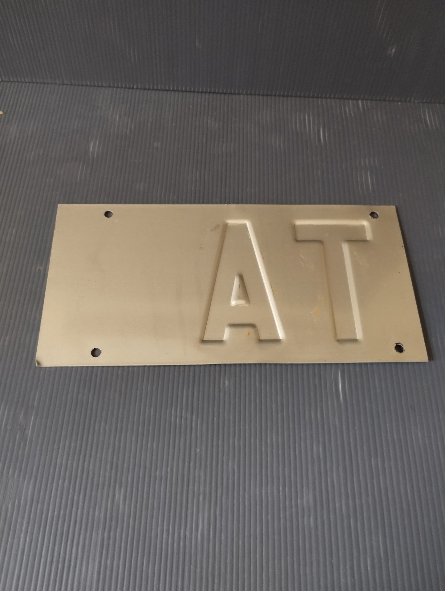 TA Taranto metal plate