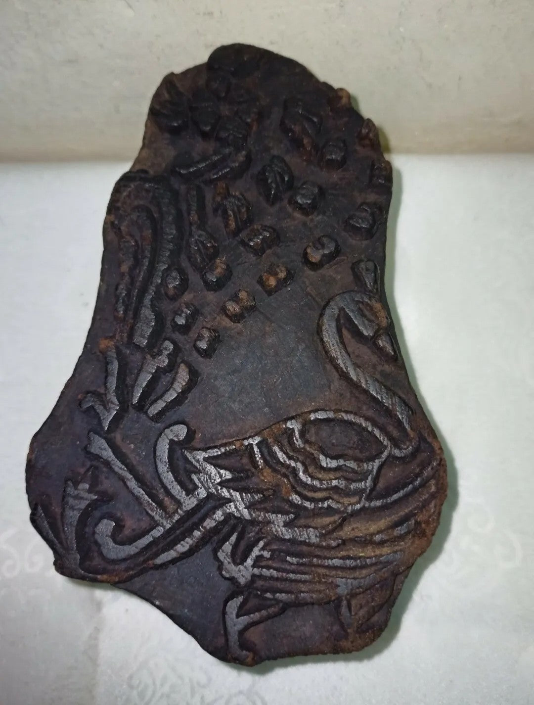 Ancient wooden stamp for fabrics and fabrics