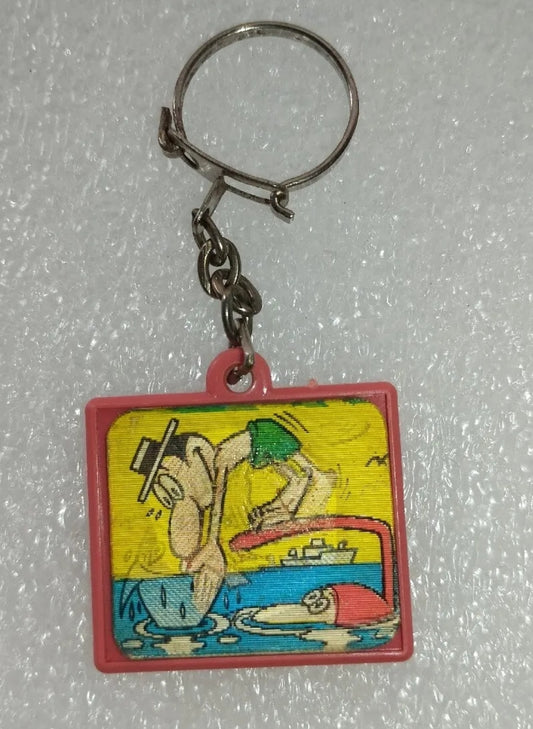 Jacovitti Movicolor key ring from the 60s