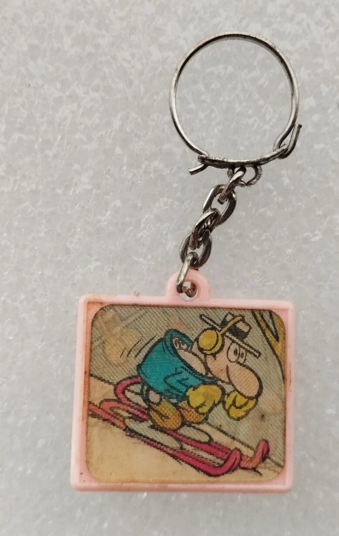 Jacovitti Movicolor key ring from the 60s