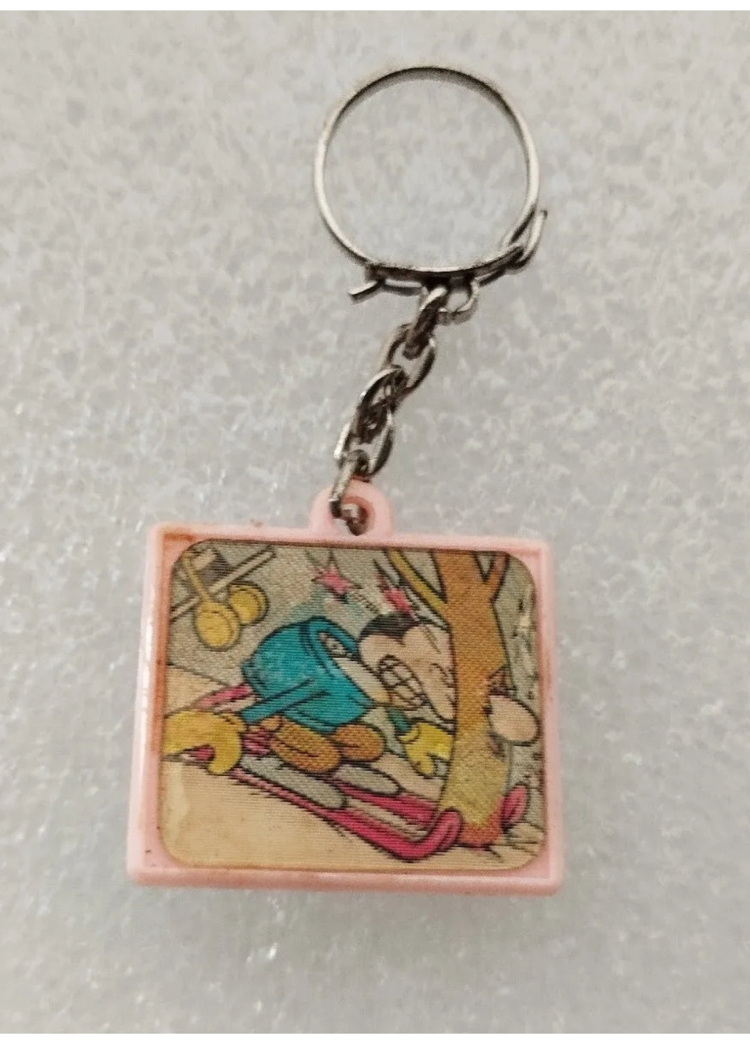 Jacovitti Movicolor key ring from the 60s