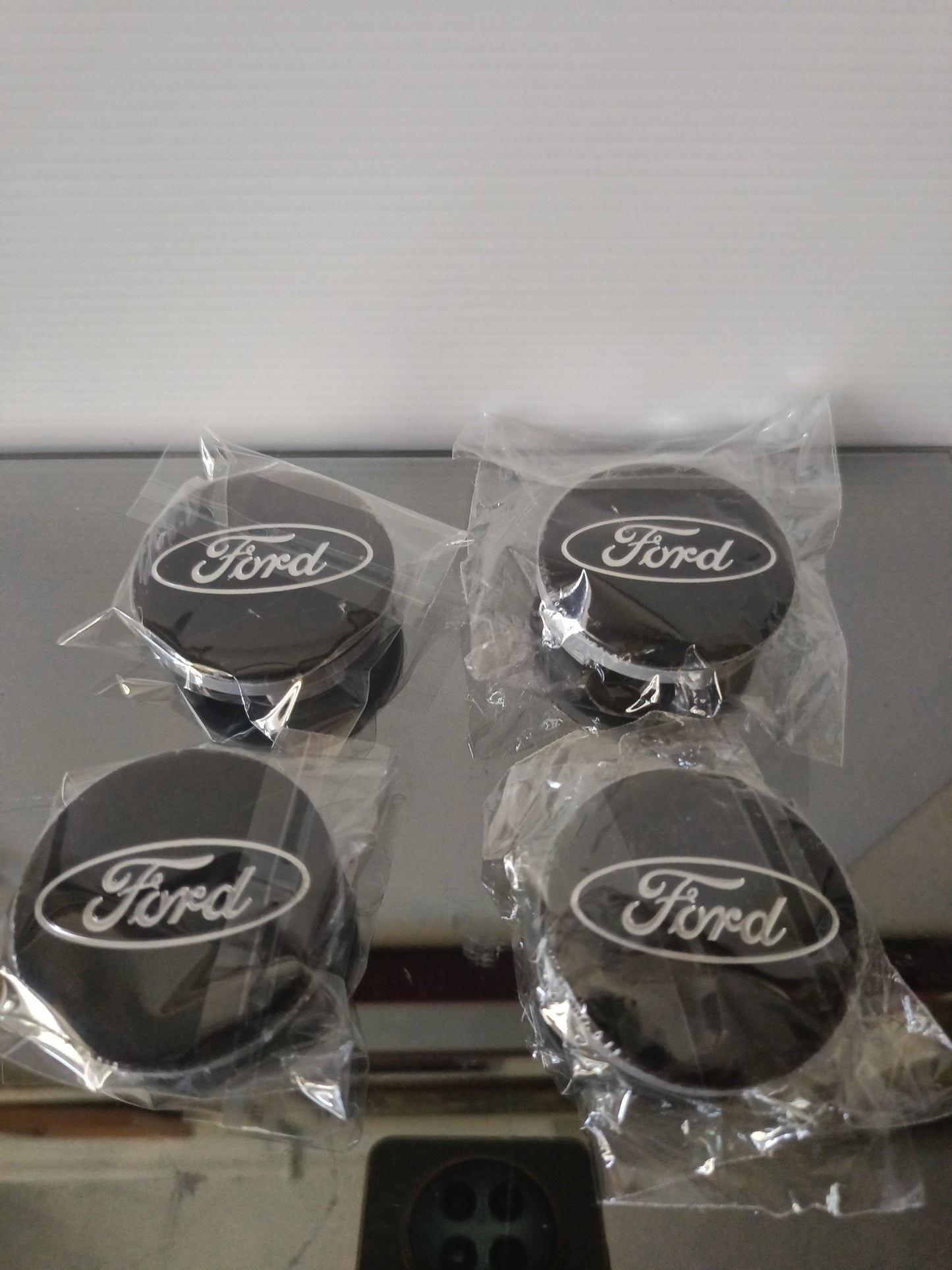 Ford 4 Coprimozzo In Plastica