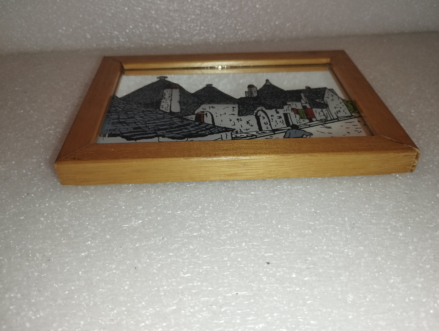 Specchio Souvenir Trulli Puglia
Con cornice in legno