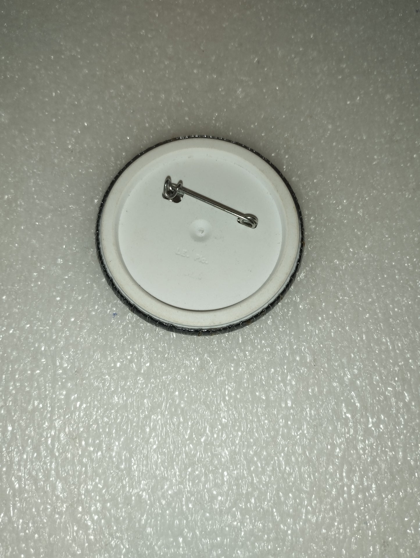 Spilla Martini In Metallo e plastica Vintage
Diametro cm. 5,5 circa