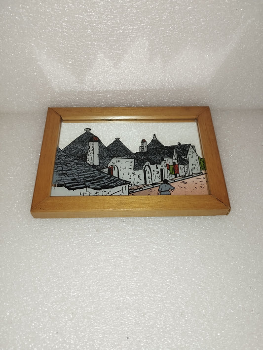 Specchio Souvenir Trulli Puglia
Con cornice in legno