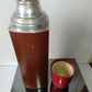 Antico Thermos The American Norwich.Conn
In Metallo e plastica
Made in U.S.A.