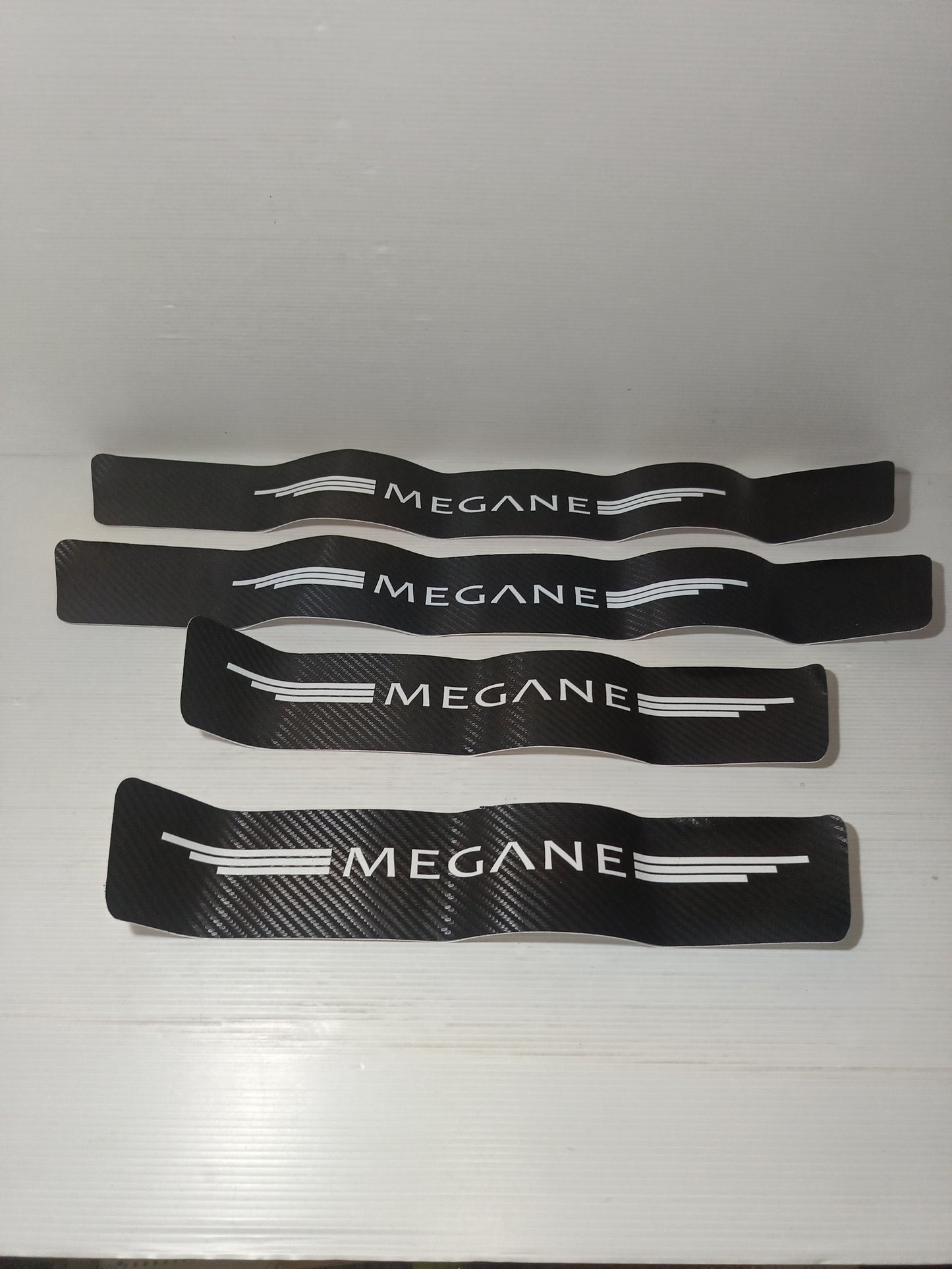 4 Adesivi Battitacco per Renault Megane 

Effetto carbonio