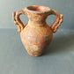 Ancient earthenware vase

 It's about reproduction