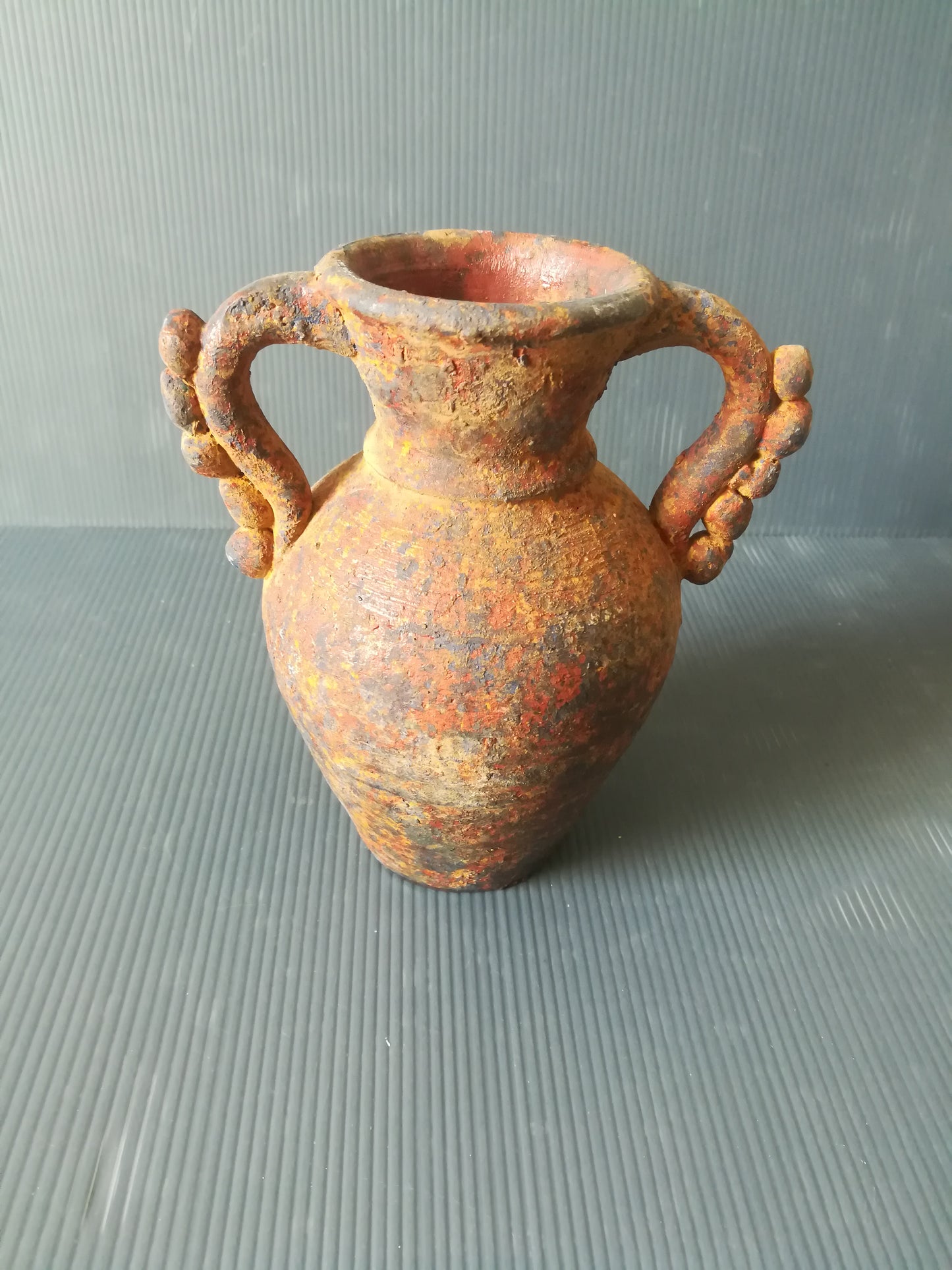 Ancient earthenware vase

 It's about reproduction