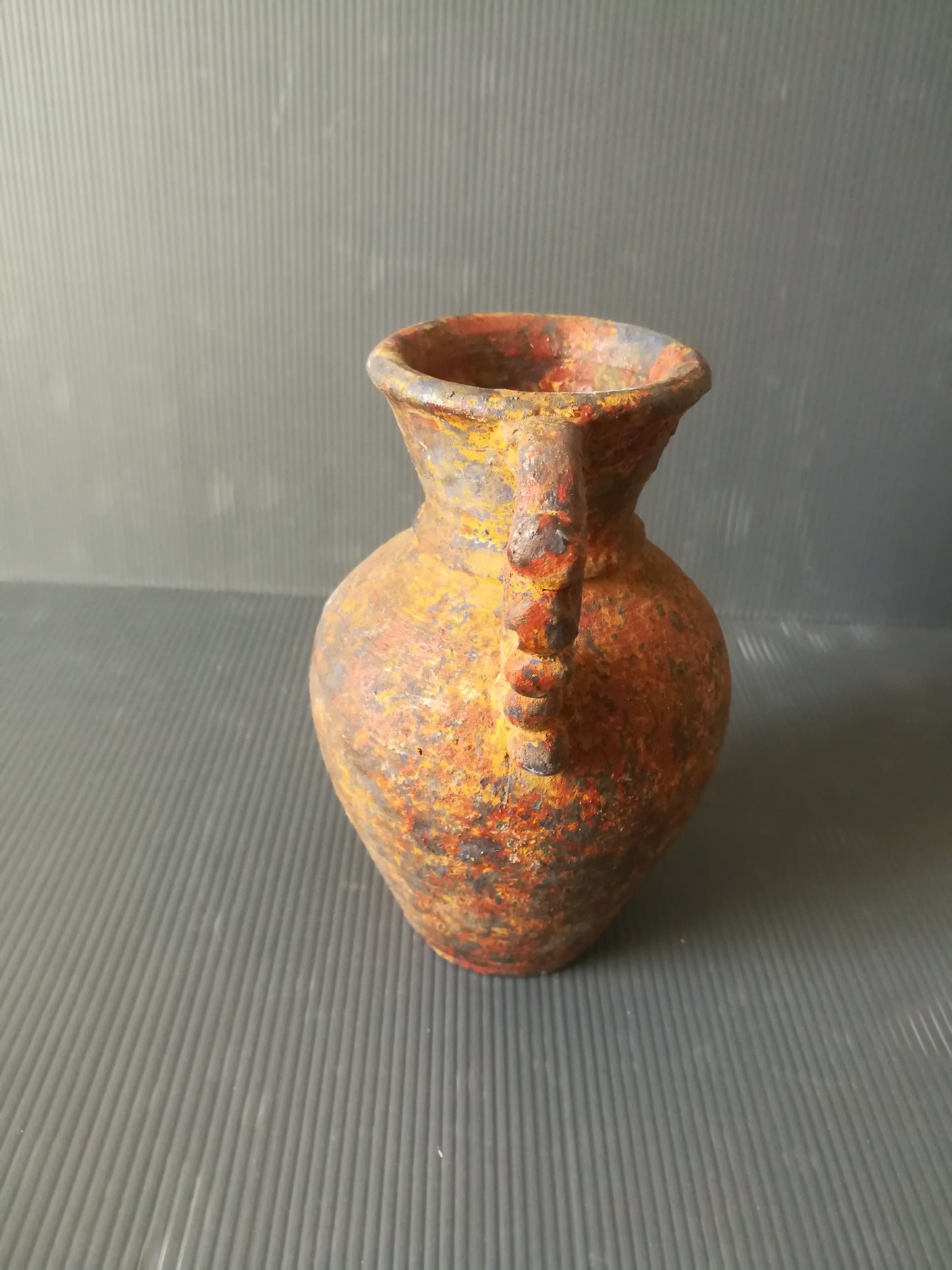 Ancient earthenware vase

 It's about reproduction