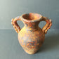 Ancient earthenware vase

 It's about reproduction