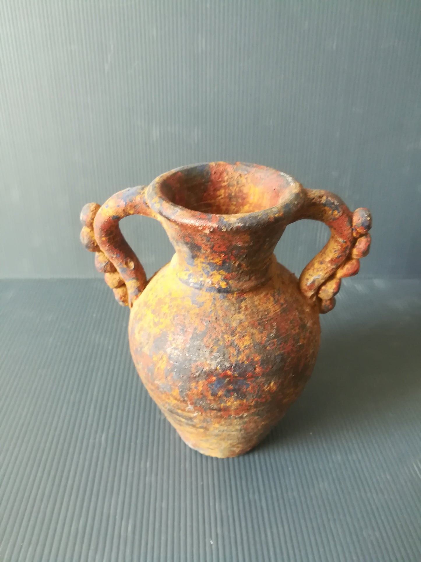 Ancient earthenware vase

 It's about reproduction