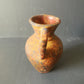 Ancient earthenware vase

 It's about reproduction