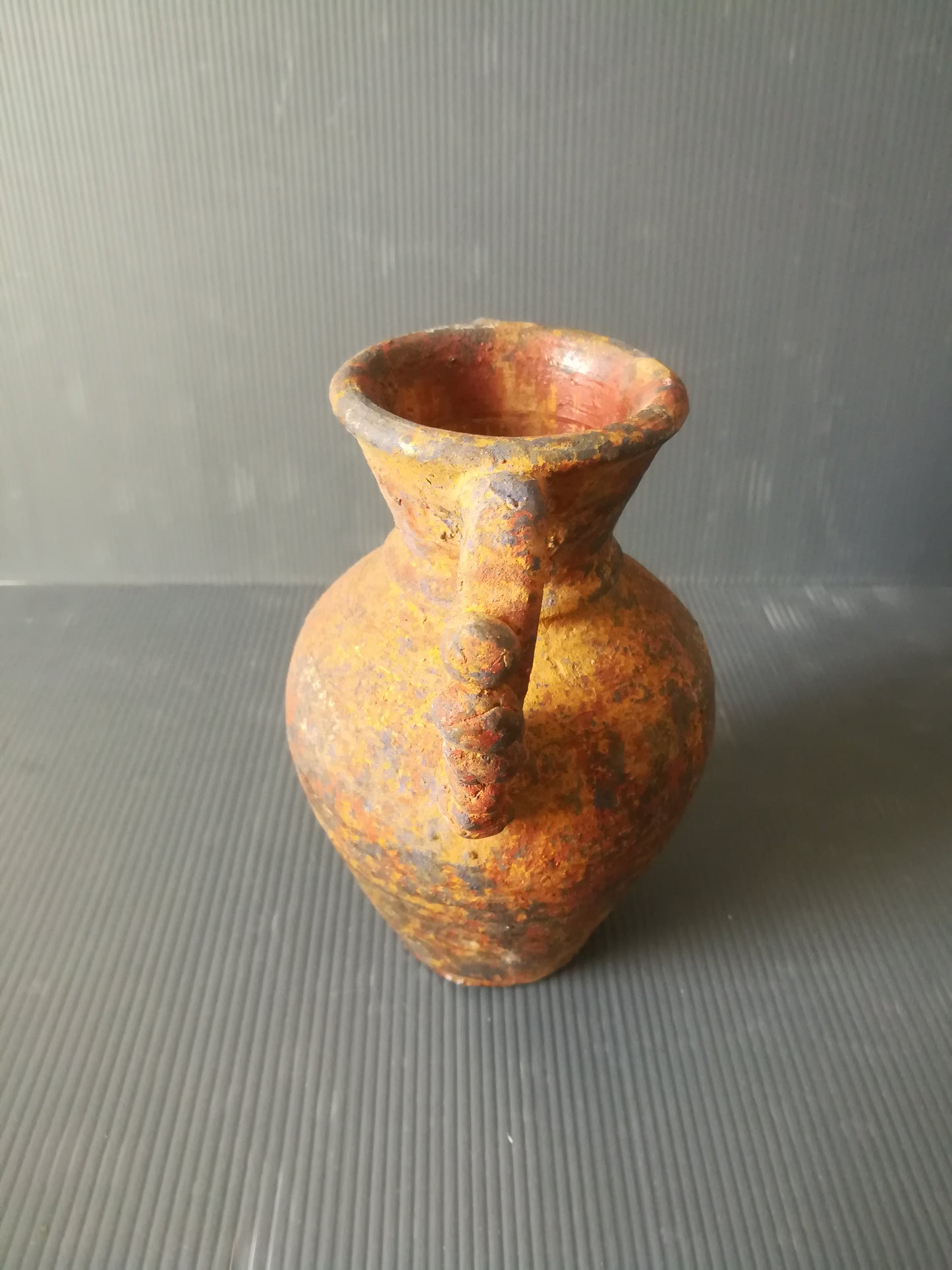 Ancient earthenware vase

 It's about reproduction