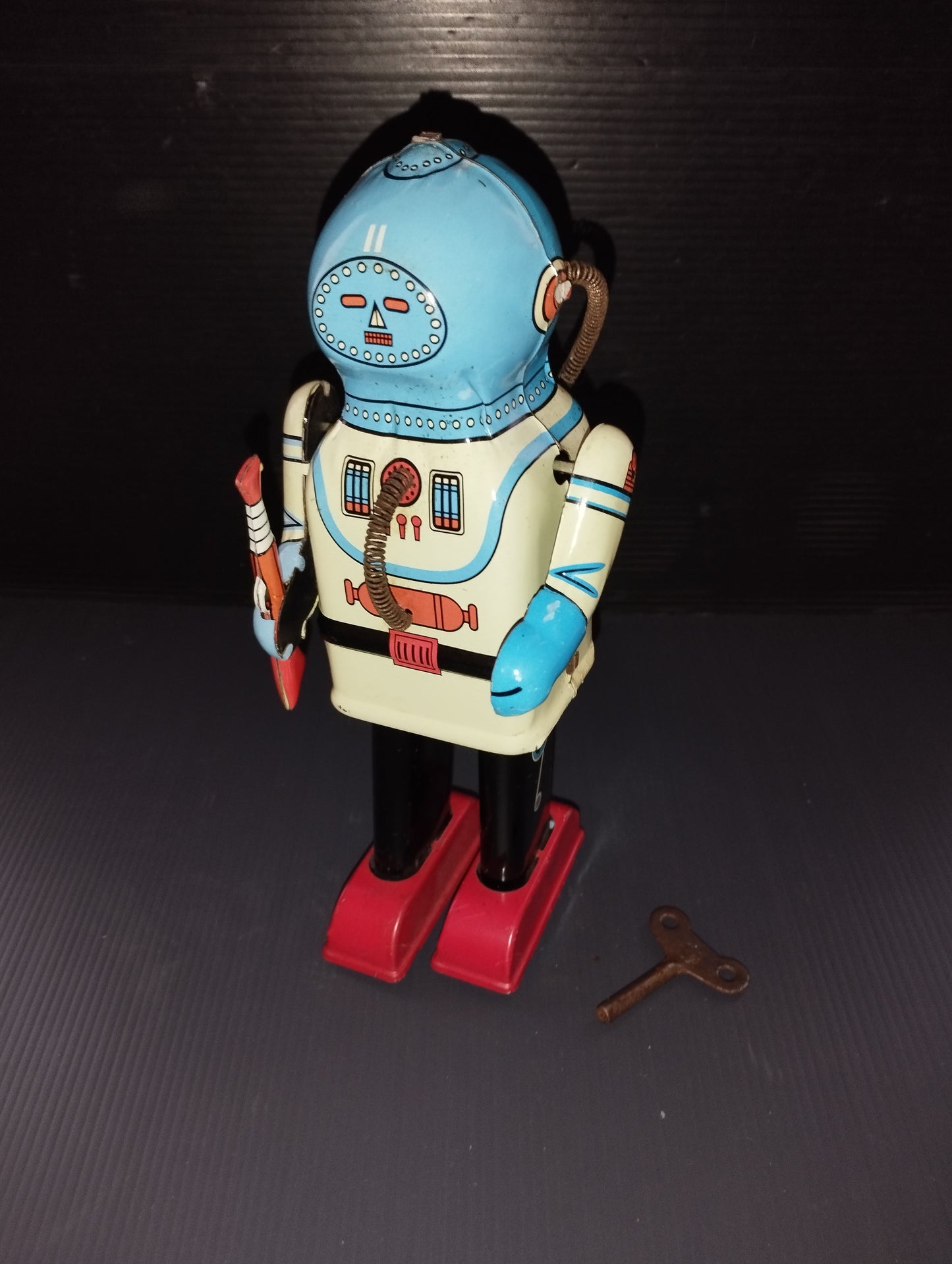 Vintage Tin Robot

 Marked TM JAPAN