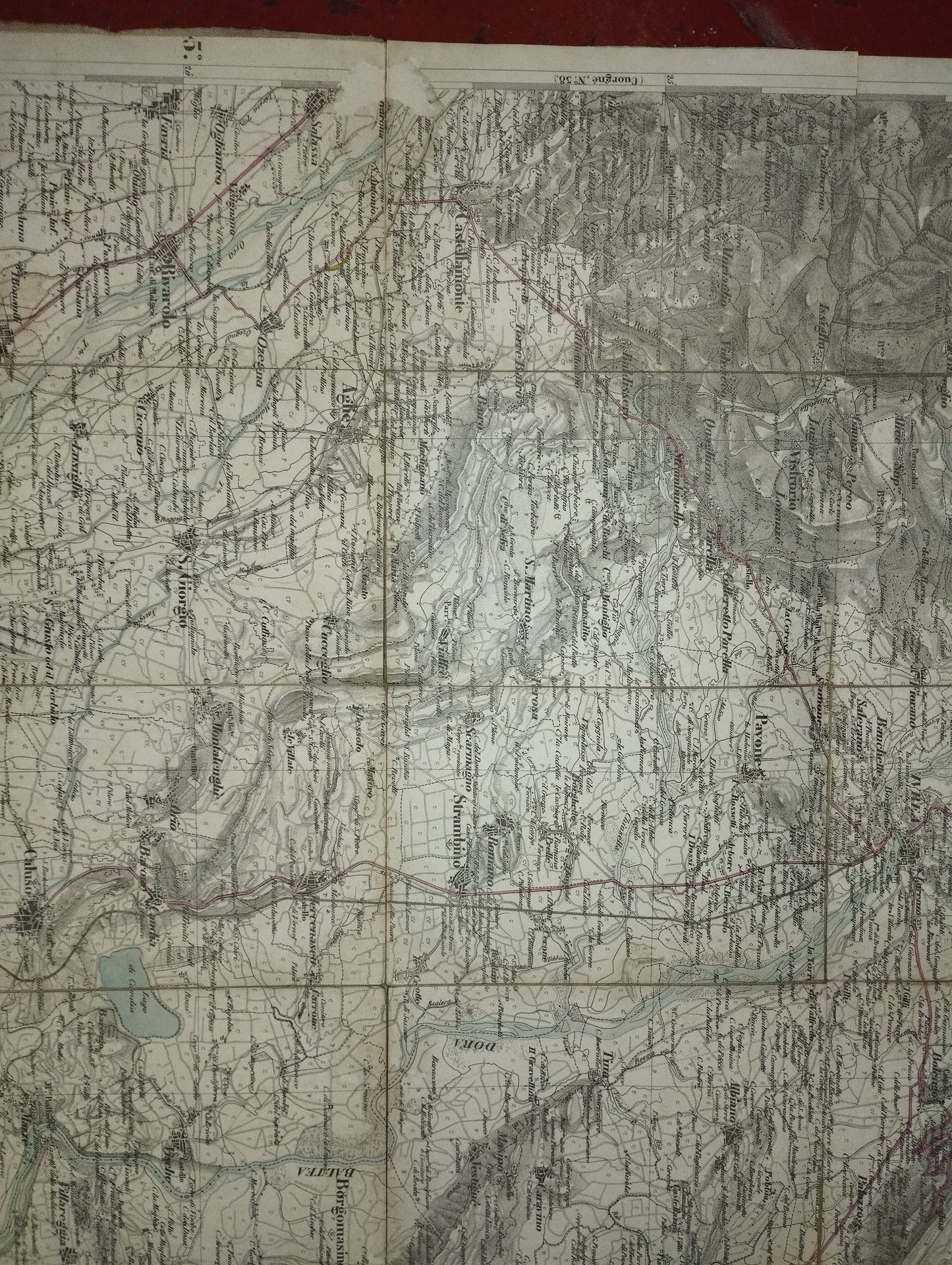 Ancient map of Ivrea

 Paper divided into small section on canvas.

 Longitude from the Royal Observatory of Turin